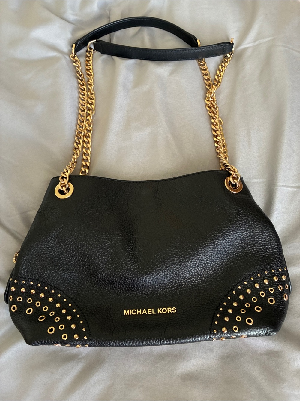 Michael Kors Black Leather Shoulder Bag with Gold Hardware and Eyelet Accents